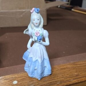 Porcelain Figurine with Blue Dress and Flowers